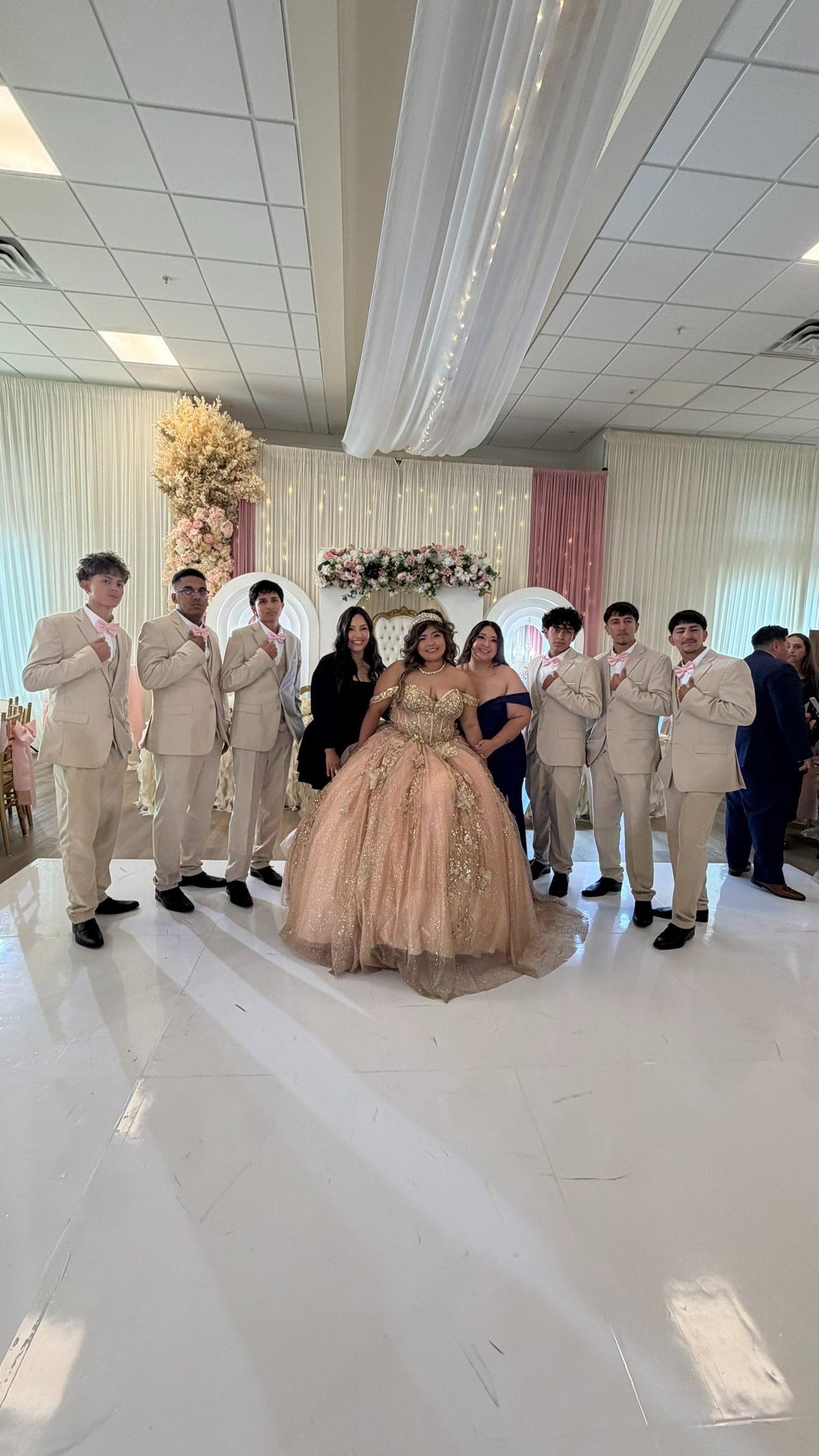 Quinceañera with her court and Elegancia Choreography Co.