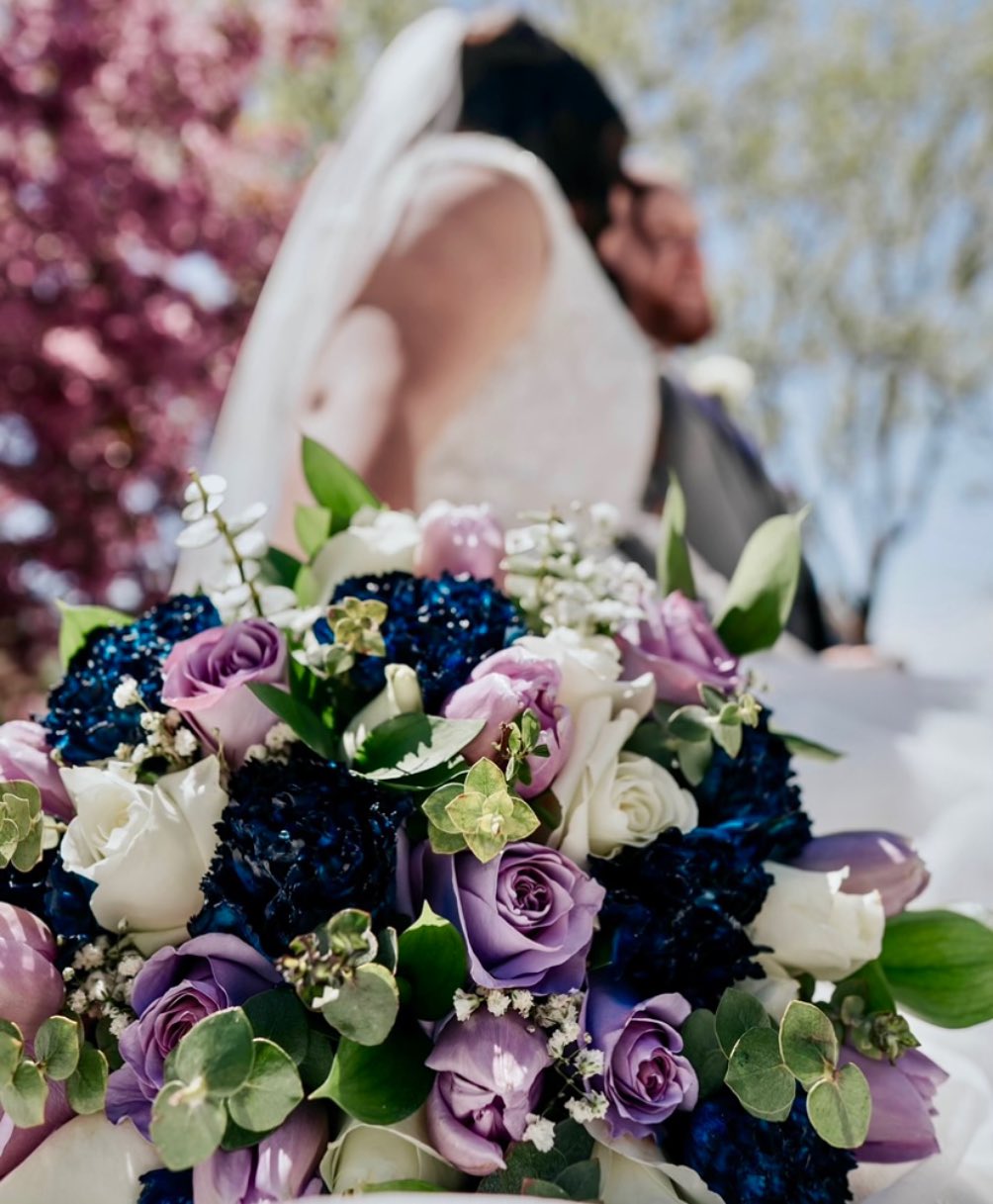 Blue and lavender bridal bouquet by Fernandez Florals