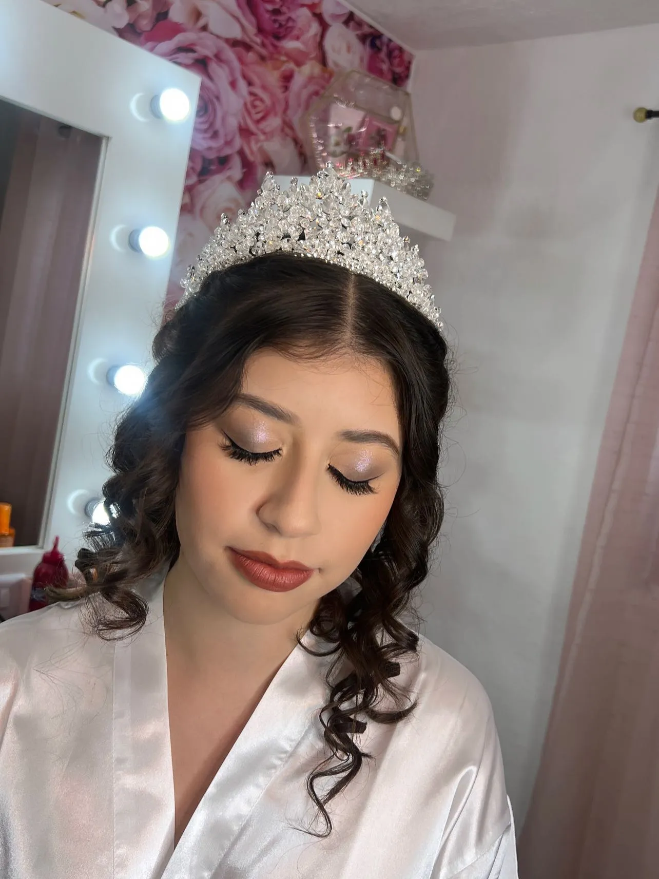 A soft shimmer eye look with a crystal tiara