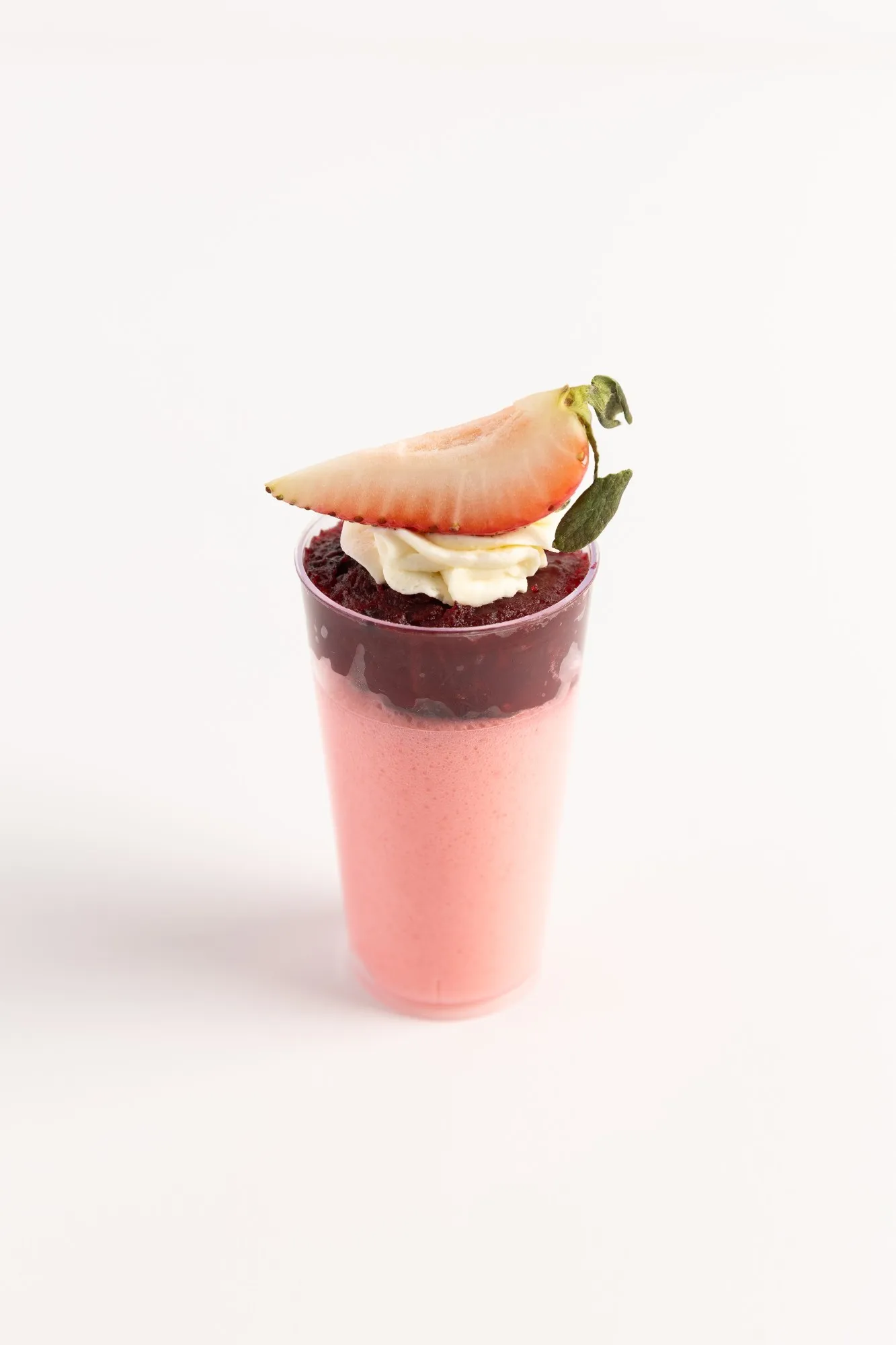 A layered strawberry mousse cup