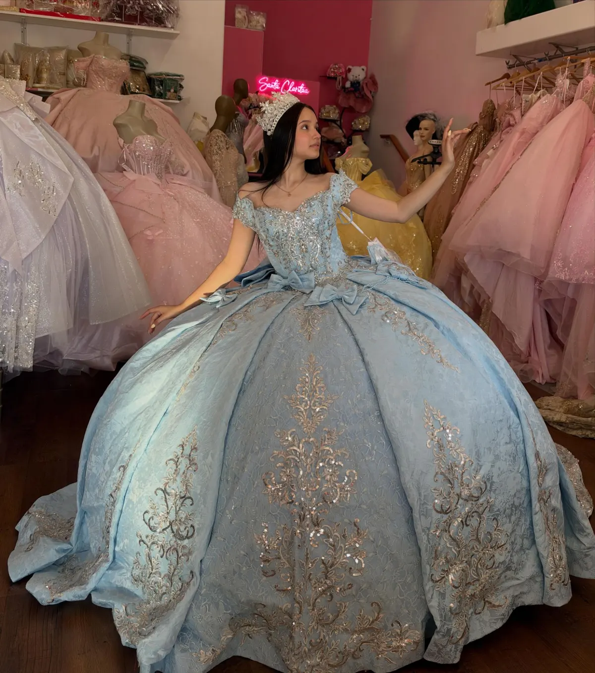 Powder-blue brocade gown with bows at the waist